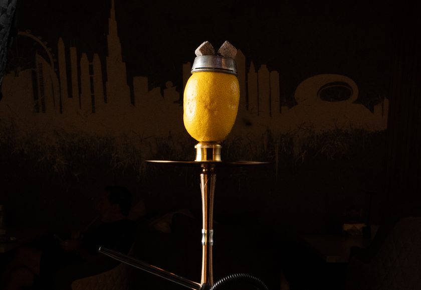 A shisha with a fresh lemon as the head